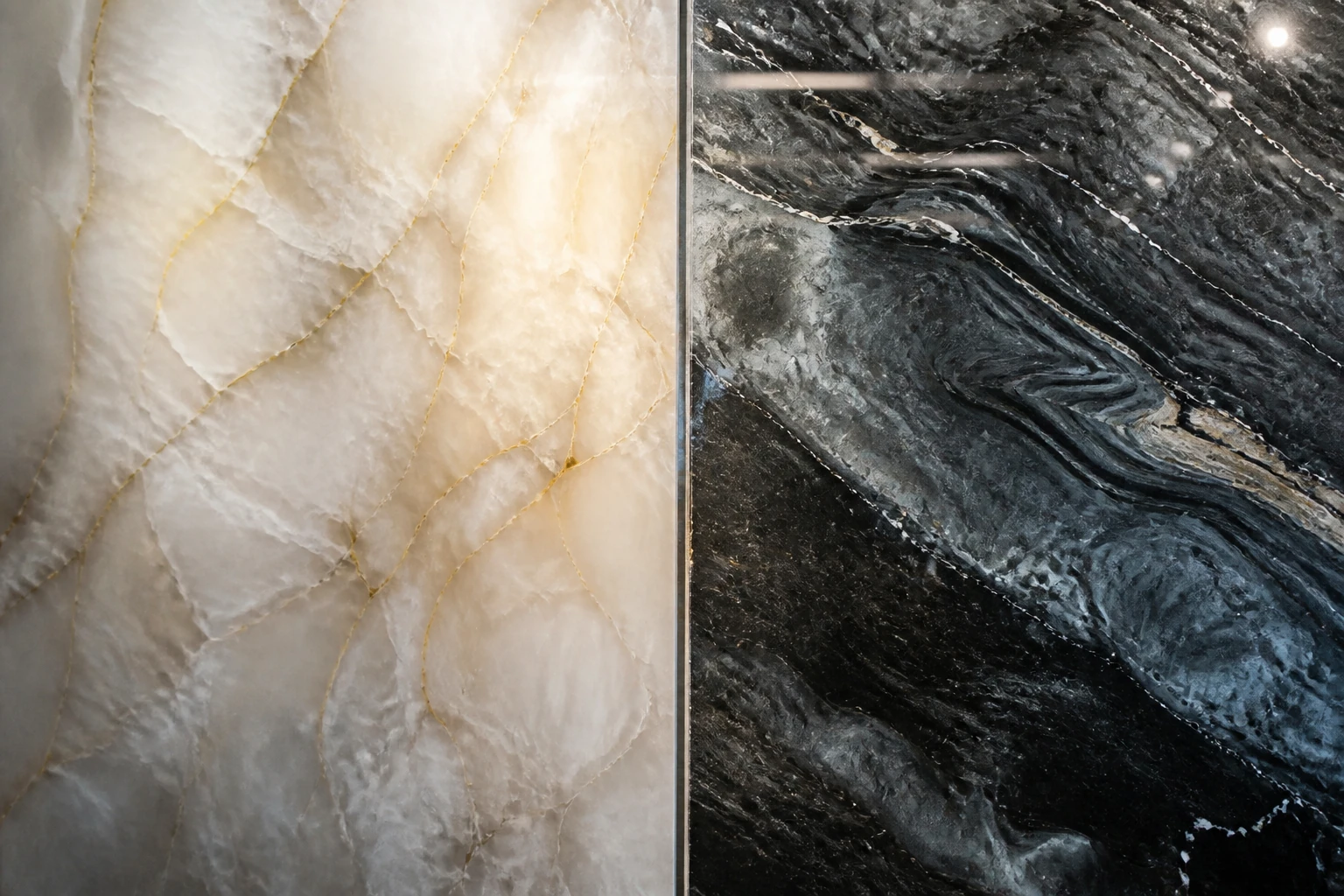 cost of installing quartz countertops: Backlit white onyx panel beside dark veined stone slab